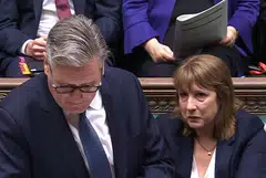Britain's Chancellor of the Exchequer Rachel Reeves (right) appears tearful during the Prime Minister's Questions (PMQ) session in the House of Commons. London, Britain, July 2, 2025.