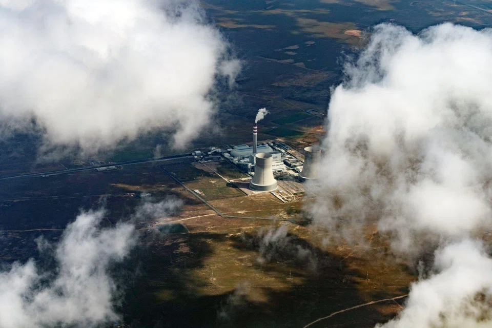 A coal-fired power plant in Yinchuan,  China, Sep 17, 2025. The projected 2030 production of coal, oil and gas exceeds levels consistent with achieving the 1.5 deg C target by more than 120 per cent, a report found.