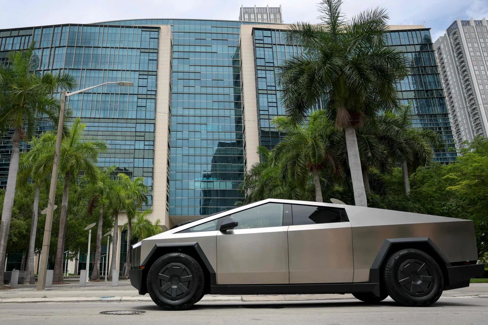 A Tesla Cybertruck passes the Wilkie D. Ferguson Jr. US Courthouse, Miami, Florida., July 14, 2025.