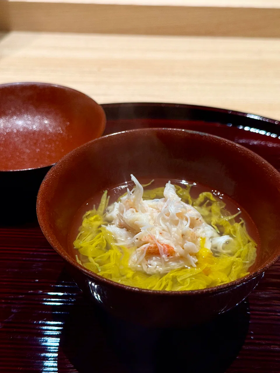 Hot dashi with a crabmeat ball.