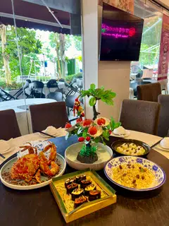 A spread of insect-based food items at the House of Seafood.