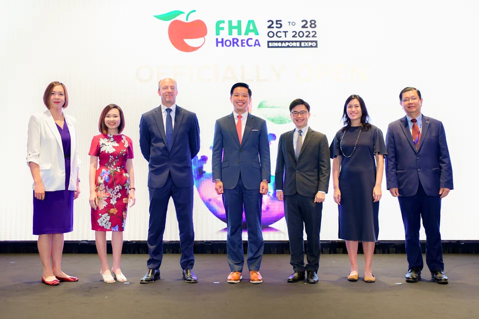 (From left) Janice Lee, event director for hospitality, food and beverage at Informa Markets, Singapore; Angeline Chan, director of food services at Enterprise Singapore; Ian Roberts, vice-president of Informa Markets, Asia; Alvin Tan, MOS for Ministry of Trade and Industry and Culture, Community and Youth; Yap Chin Siang, deputy chief executive of STB; Kwee Wei-Lin, president of SHA; and David Tan, president of Singapore Food Manufacturers' Association are at the opening ceremony of Food & Hotel Asia (FHA) - Hotel, Restaurant and Café 2022.