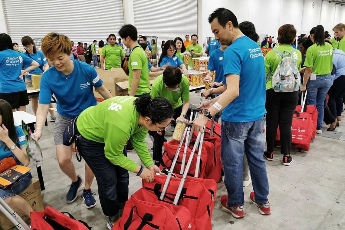 Spreading cheer with bags of 'blessings'