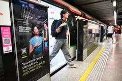 A SkillsFuture poster at Yishun MRT station, encouraging individuals to take ownership of their own skills development to get themselves future-ready.