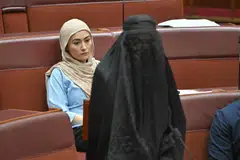 Pauline Hanson wore the burqa in the upper house on Monday after she was denied permission to introduce a Bill banning burqas and other face coverings in public spaces.