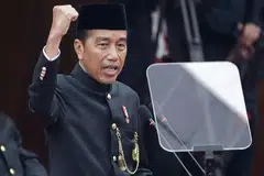 Indonesia's President Joko Widodo, wearing the traditional Betawi attire, delivers his annual state of the nation address at the parliament building in Jakarta on Aug 16, 2024.  
