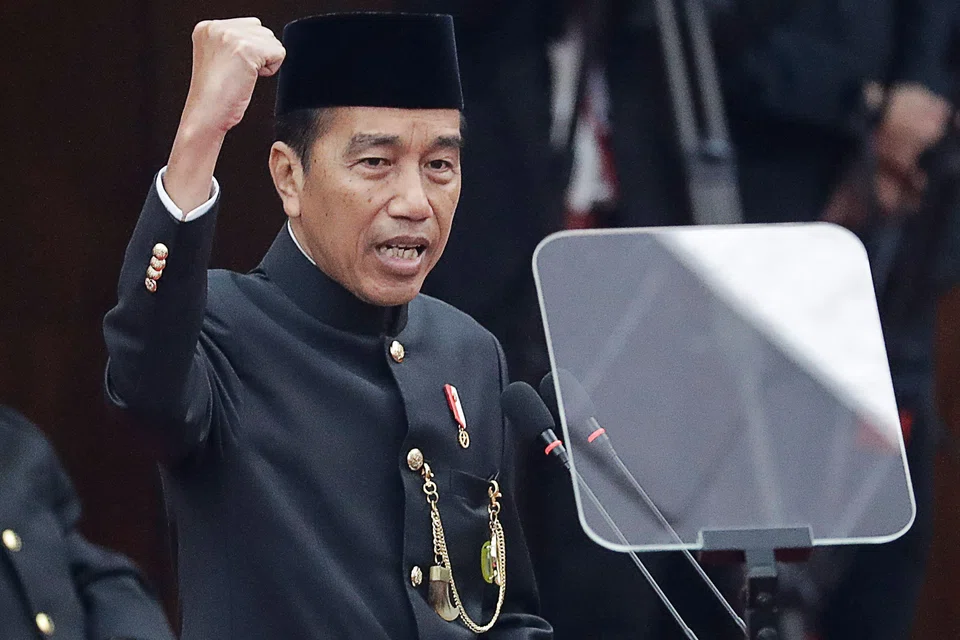 Indonesia's President Joko Widodo, wearing the traditional Betawi attire, delivers his annual state of the nation address at the parliament building in Jakarta on Aug 16, 2024.  
