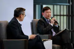 Transport Minister and Second Finance Minister Chee Hong Tat hopes that Singapore can remain friends with the two largest superpowers in the world. On the left is The Straits Times editor Jaime Ho.