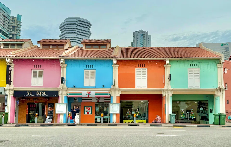 The four shophouses are registered under two title deeds and zoned for “commercial” use, with one approved as a massage-spa establishment.
