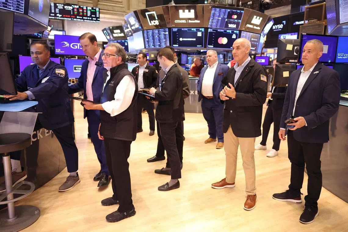 Traders on the floor of the New York Stock Exchange on Aug 6, 2024, a day after the Dow Jones and the S&P 500 had their worst day of trading since 2022.