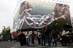 An anti-US billboard in Teheran on Apr 20. The price of crude has increased as the US maintains its blockade on the  Hormuz strait. 