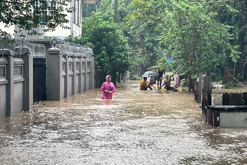Floods in northern Myanmar have trapped thousands of people in their homes and cut electricity and phone lines, and the state weather office has warned of more heavy rain. 