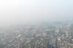 Residents of India's capital, New Delhi choked in a blanketing toxic smog as worsening air pollution surged past 50 times the World Health Organization's recommended daily maximum.