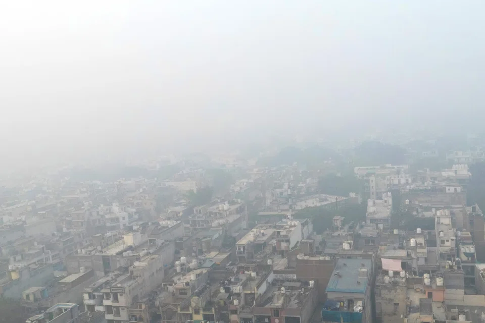 Residents of India's capital, New Delhi choked in a blanketing toxic smog as worsening air pollution surged past 50 times the World Health Organization's recommended daily maximum.