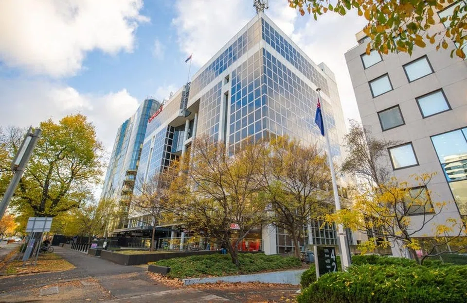 The freehold office building in Melbourne's St Kilda Road has been sold to retail billionaire Solomon Lew.