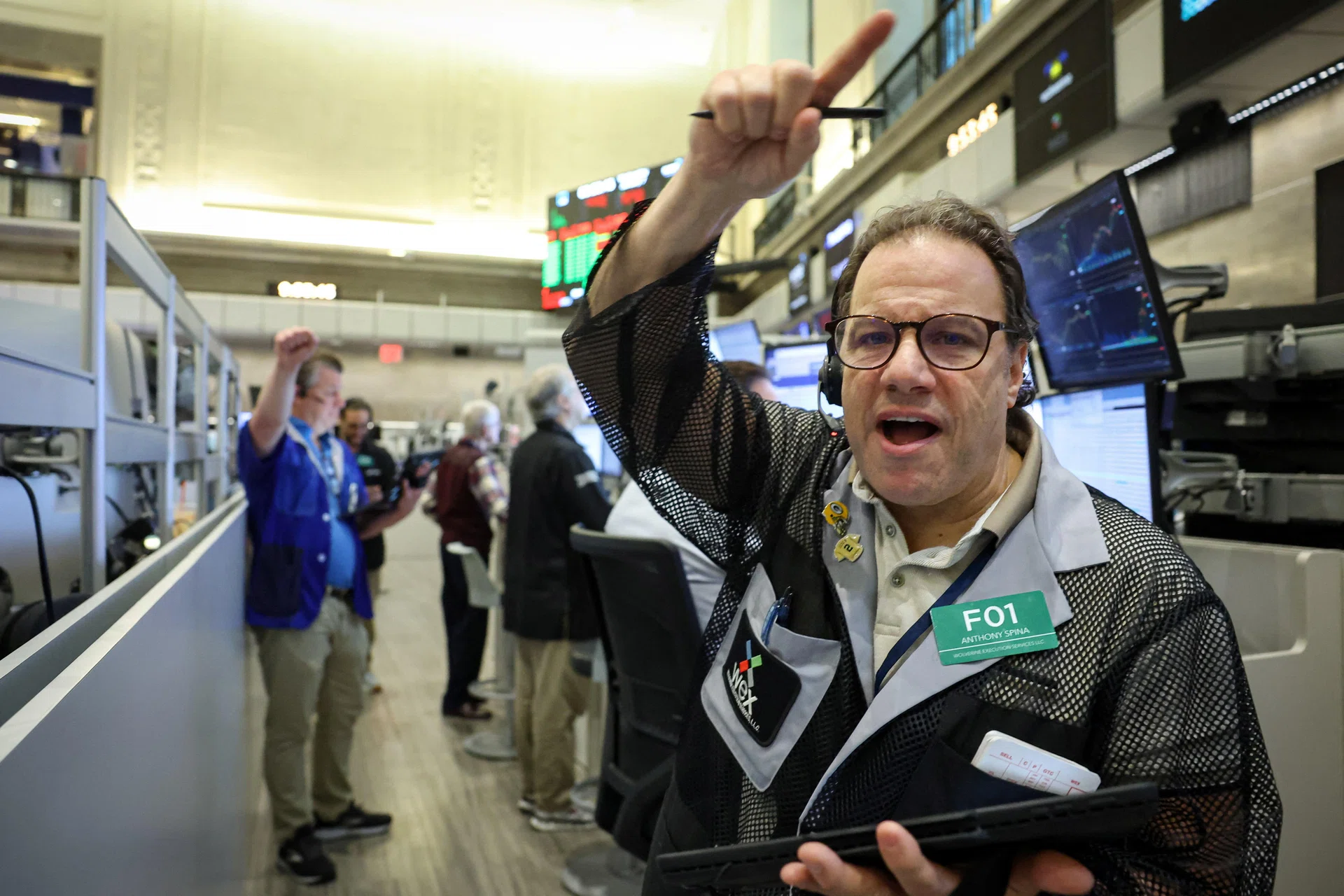 Wall Street opens higher as chip stocks shine