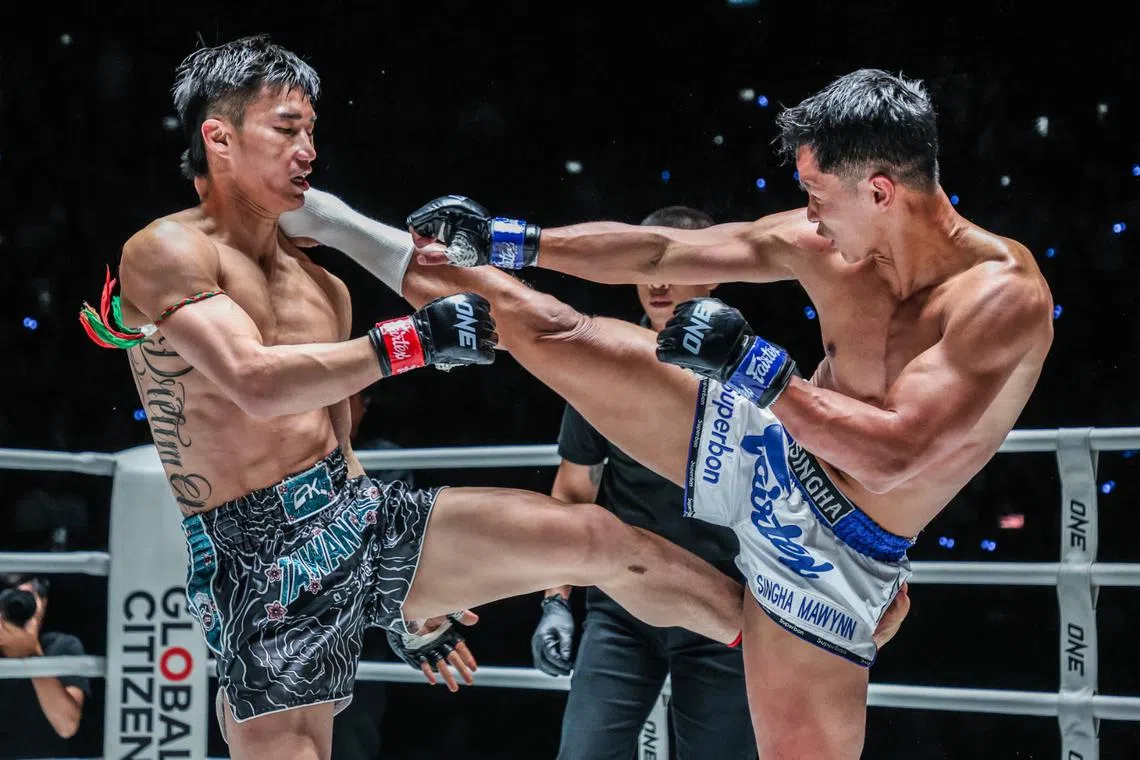 Fighters in action at the weekly One Friday Fights event at the Lumpinee Boxing Stadium in Bangkok.