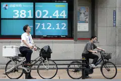 Tokyo edged up in the morning session as the Bank of Japan’s key Tankan survey of Japan’s largest manufacturers showed business confidence rose for the first time in two quarters.