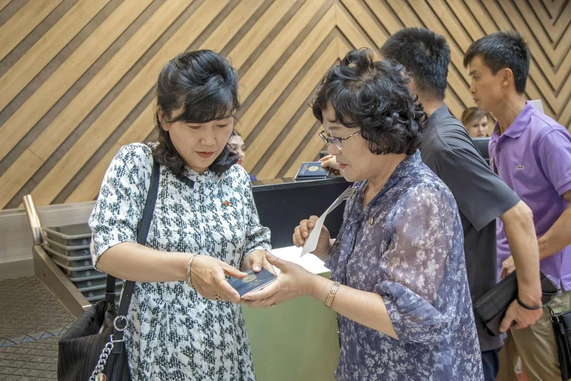 Passengers at the check-in counter for the first flight connecting Moscow and Pyongyang in nearly three decades, Moscow, Russia, July 27, 2025. 