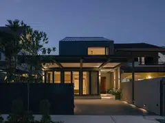 Matou House explores the use of a new architectural wraparound for an old house. 