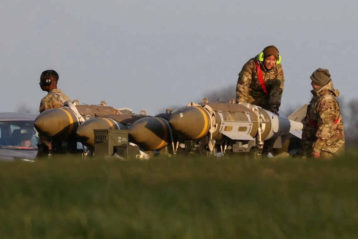 US military personnel with munitions at the RAF Fairford airbase in Gloucestershire, UK. Defence officials in Asia are growing alarmed that more American firepower will shift over time if the Middle East conflict drags on.