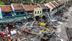 Damaged buildings and debris on a street after Super Typhoon Yagi hit Ha Long, in Quang Ninh province, Vietnam, Sept 8, 2024. 