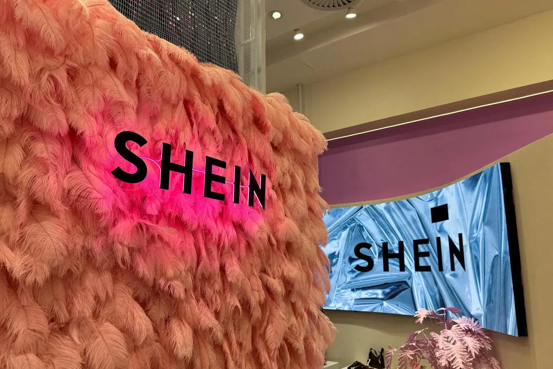 FILE PHOTO: Shein logo is seen inside the company's first pop-up store in Johannesburg, South Africa, August 2, 2024. REUTERS/Sisipho Skweyiya/File Photo