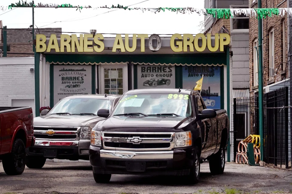 Core inflation was curbed by a second straight monthly drop in prices of used cars and trucks.