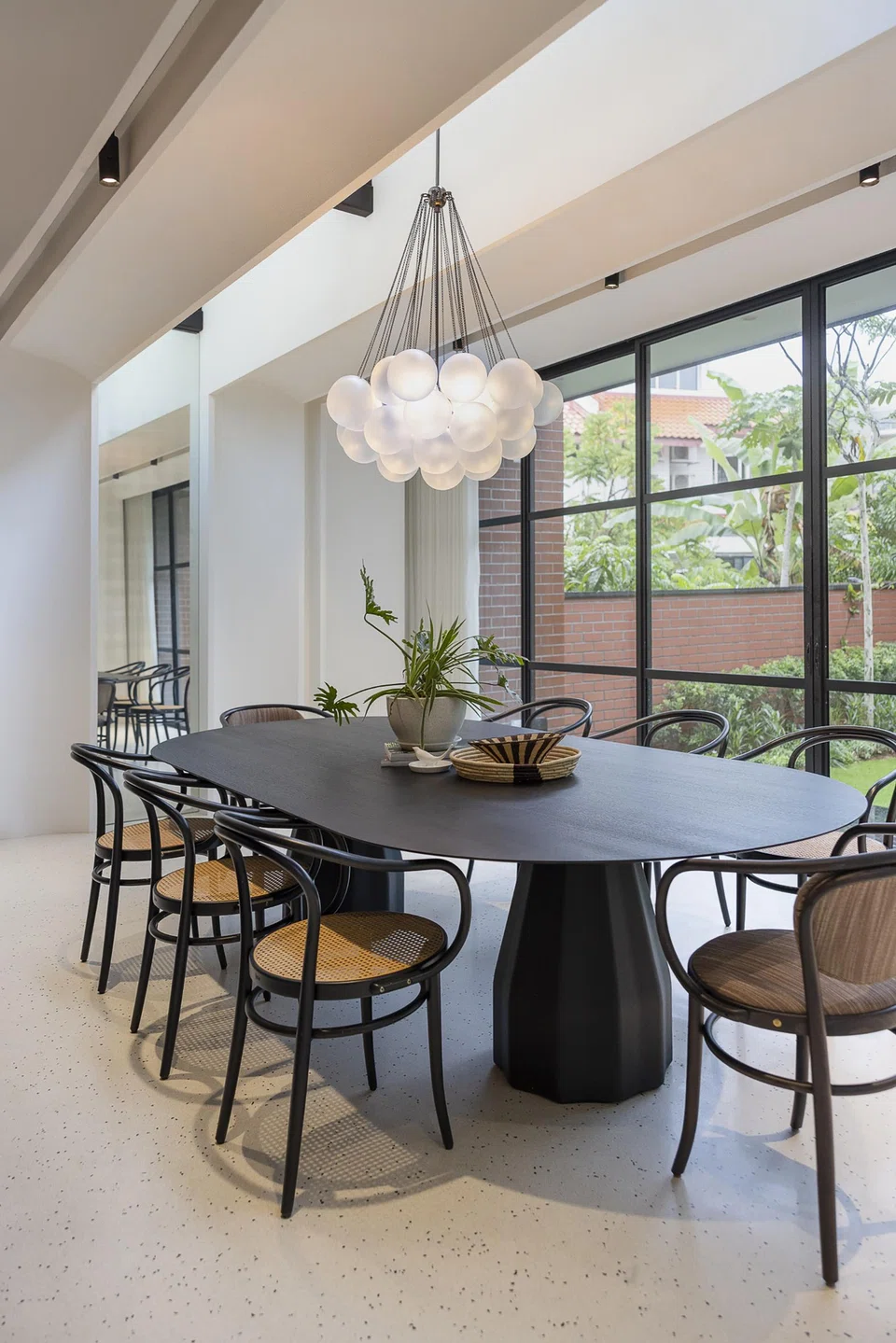 An extension was built slightly into the gardens, forming the new dining room that resembles a glasshouse. 