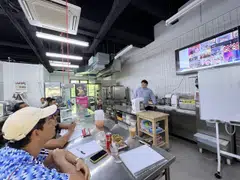 A session on menu engineering and cost management at Excelerate.sg’s training kitchen. Beyond acquiring operational skills, workshop participants will learn to develop unique business models.