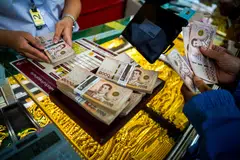 From here, the baht may dip to 33.50 per US dollar through the end of 2026, according to BNP Paribas. 