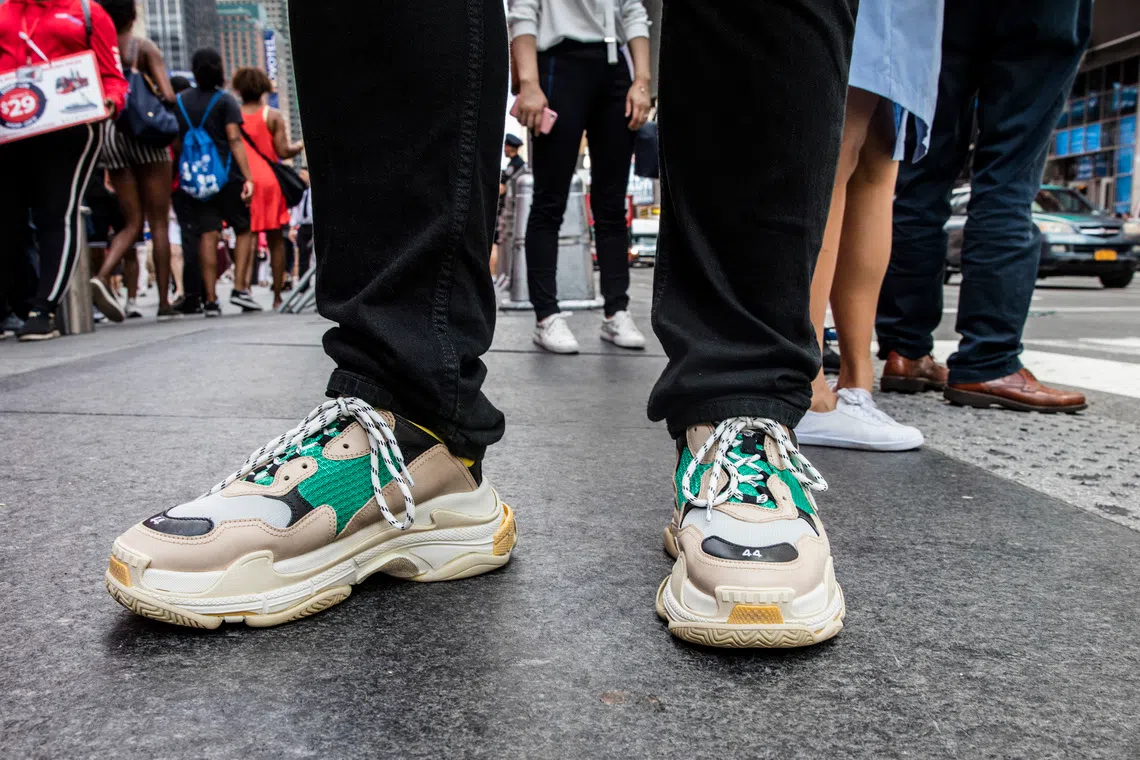 FILE — Balenciaga sneakers in New York, July 18, 2018. “When prices are shooting up and you feel the fear of missing out, you can talk yourself into imagining intrinsic value in anything,” writes New York Times columnist Farhad Manjoo. (Tony Cenicola/The New York Times)