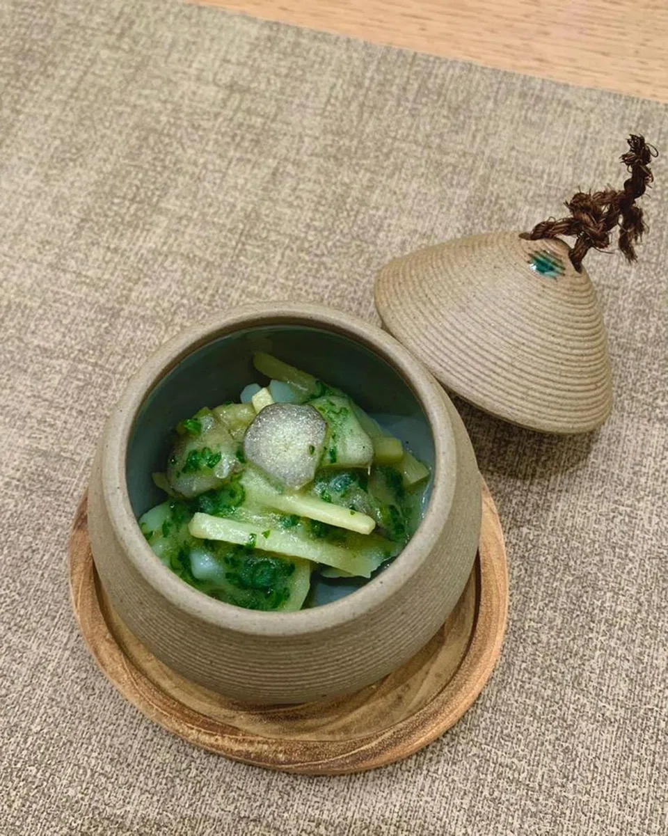 Squid takes the place of chicken in this take on pak cham kai.