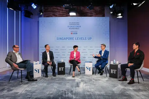 From left: ST associate editor Vikram Khanna; UOB senior economist Alvin Liew; Second Minister for Finance & National Development Indranee Rajah; ASME President Ang Yuit; and NTUC deputy secretary general Desmond Tan.