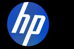 HP's disappointing profit forecast overshadowed the company’s first revenue gain in two years, suggesting an end to a long slump in demand for personal computers.