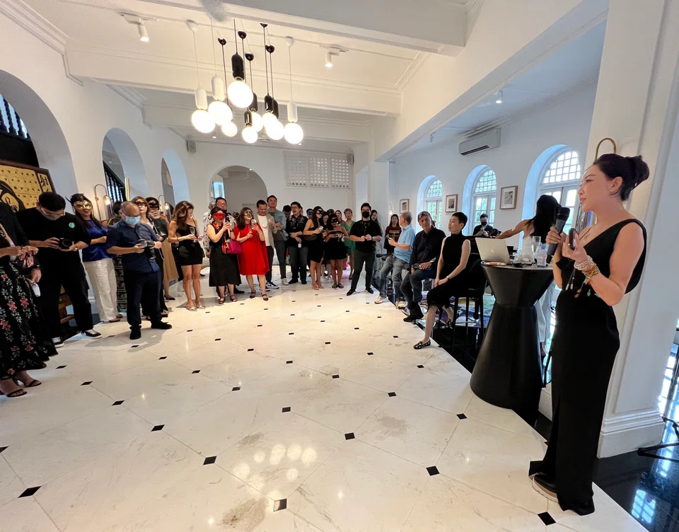 Dr Jie Li-Elbraechter (extreme right) hosted the first art appreciation party for a select group of guests at a Mount Pleasant black-and-white bungalow. 