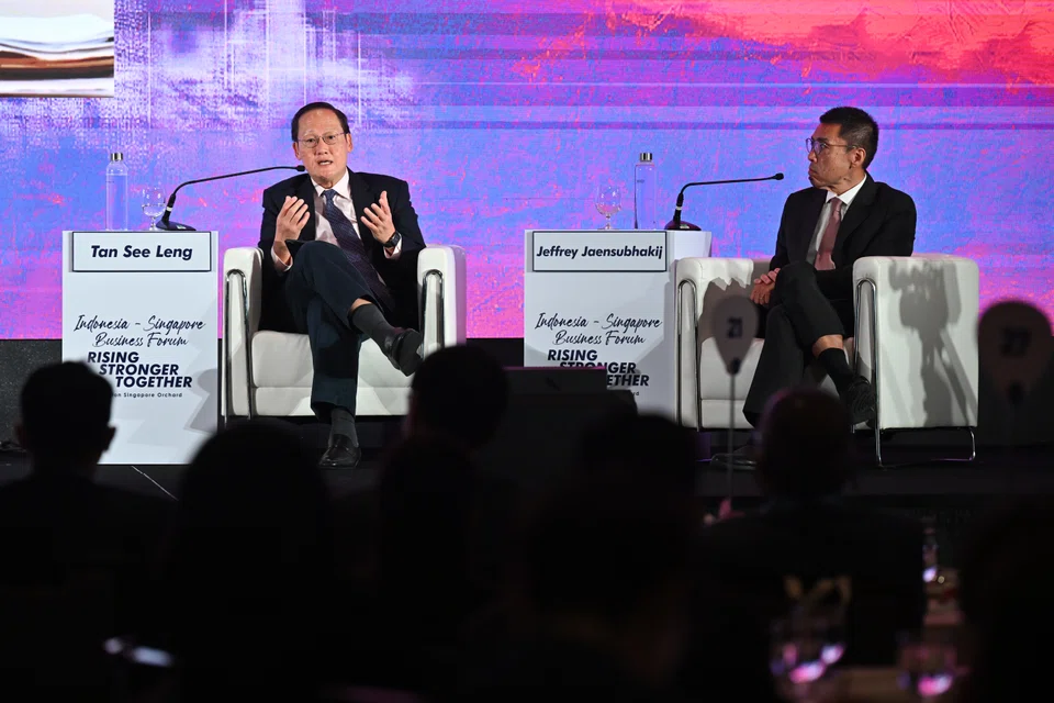 (From left) Tan See Leng (Minister for Manpower and Second Minister for Trade and Industry - Singapore); and Jeffrey Jaensubhakij (Group Chief Investment Officer of Government of Singapore Investment Corporation/ GIC Private Limited) speaking on 'Renewables as Key Growth Engines in the Post-Covid Economy' during Indonesia - Singapore Business Forum at Hilton Singapore Orchard Hotel on June 14, 2022.
