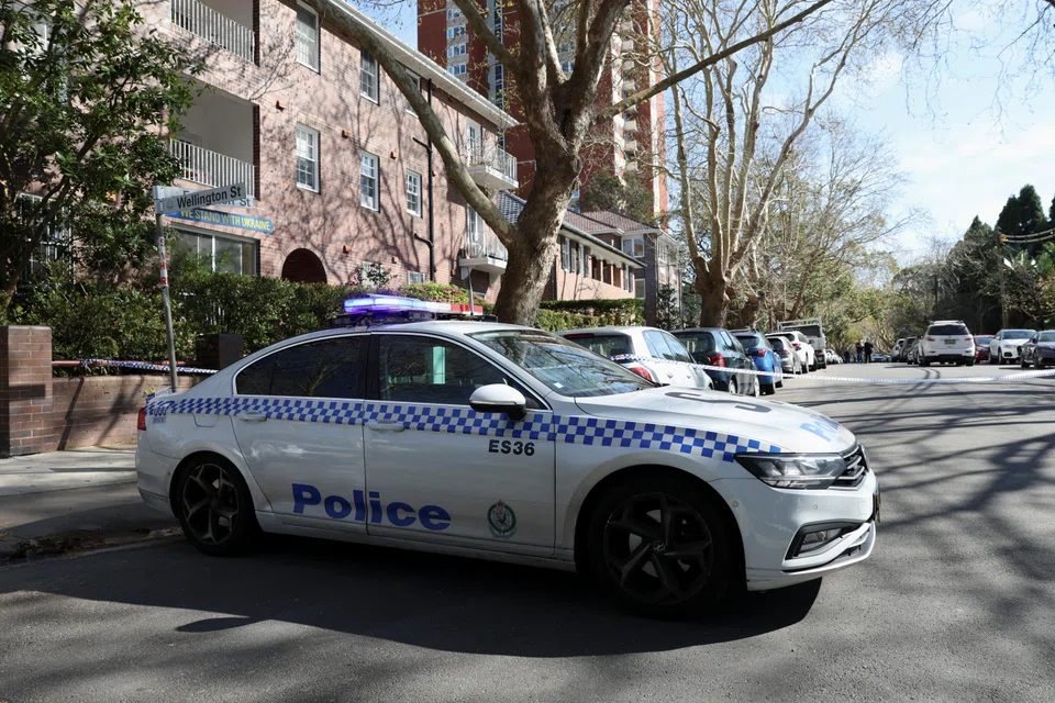 A police vehicle is parked on a closed street near the scene where a car crashed into the Russian consulate in Sydney, Australia, Sep 1, 2025.