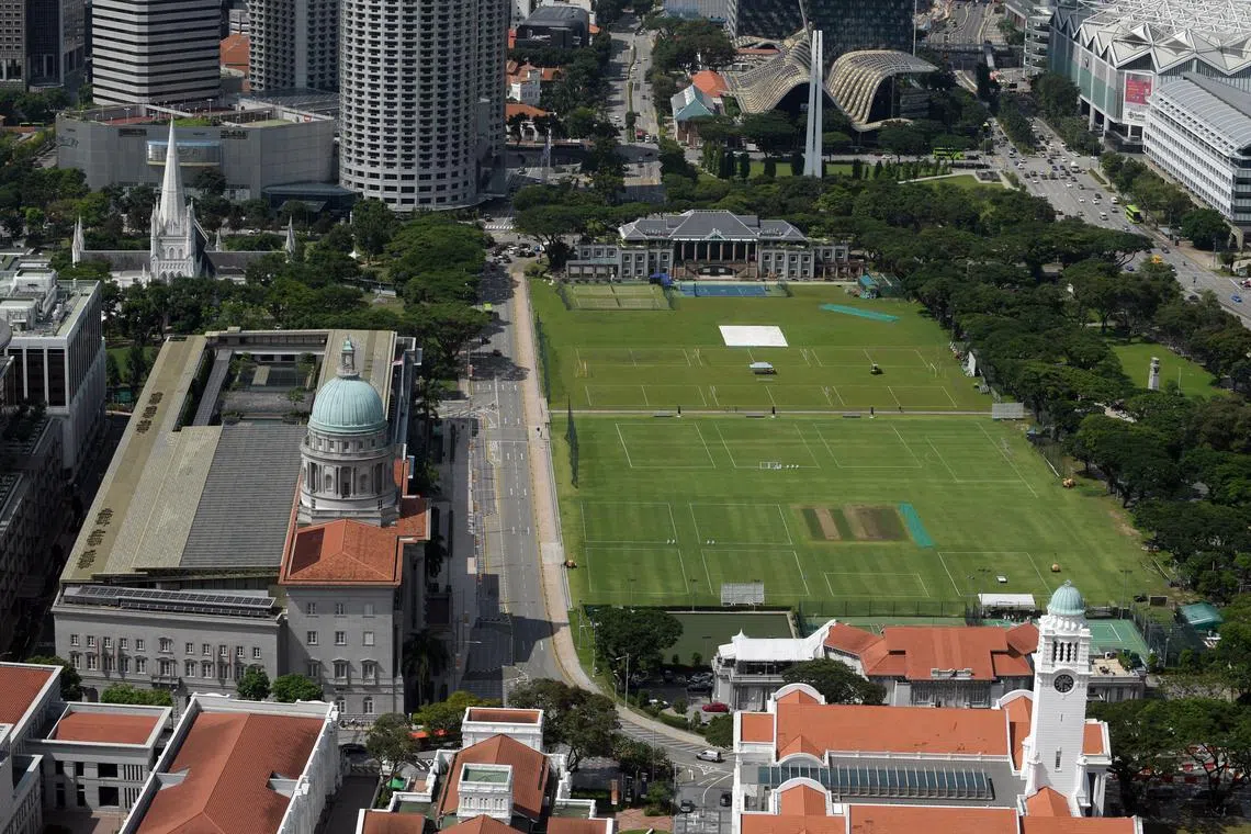 The old City Hall (left) and the Padang (right), with other historical buildings. 