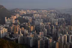 A years-long property crisis in China has increasingly pressured Hong Kong developers, from bigger indebted builders to smaller ones, including Emperor. 