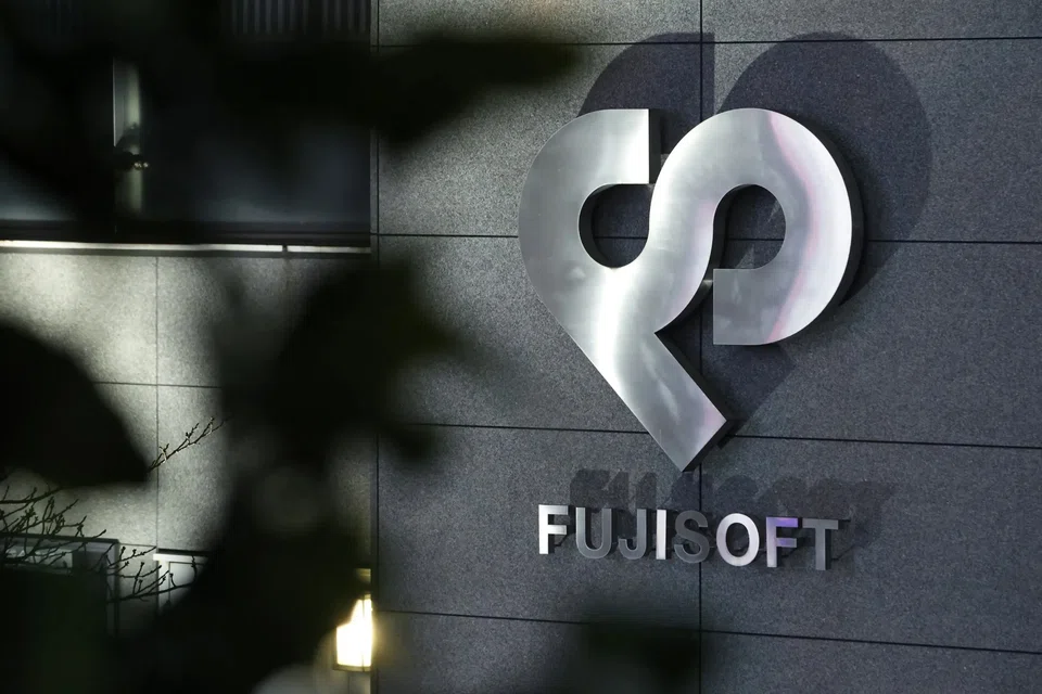 KKR increased its tender offer for Fuji Soft to 9,850 yen per share, putting it above the 9,600 yen per share that Bain Capital said it planned to offer.