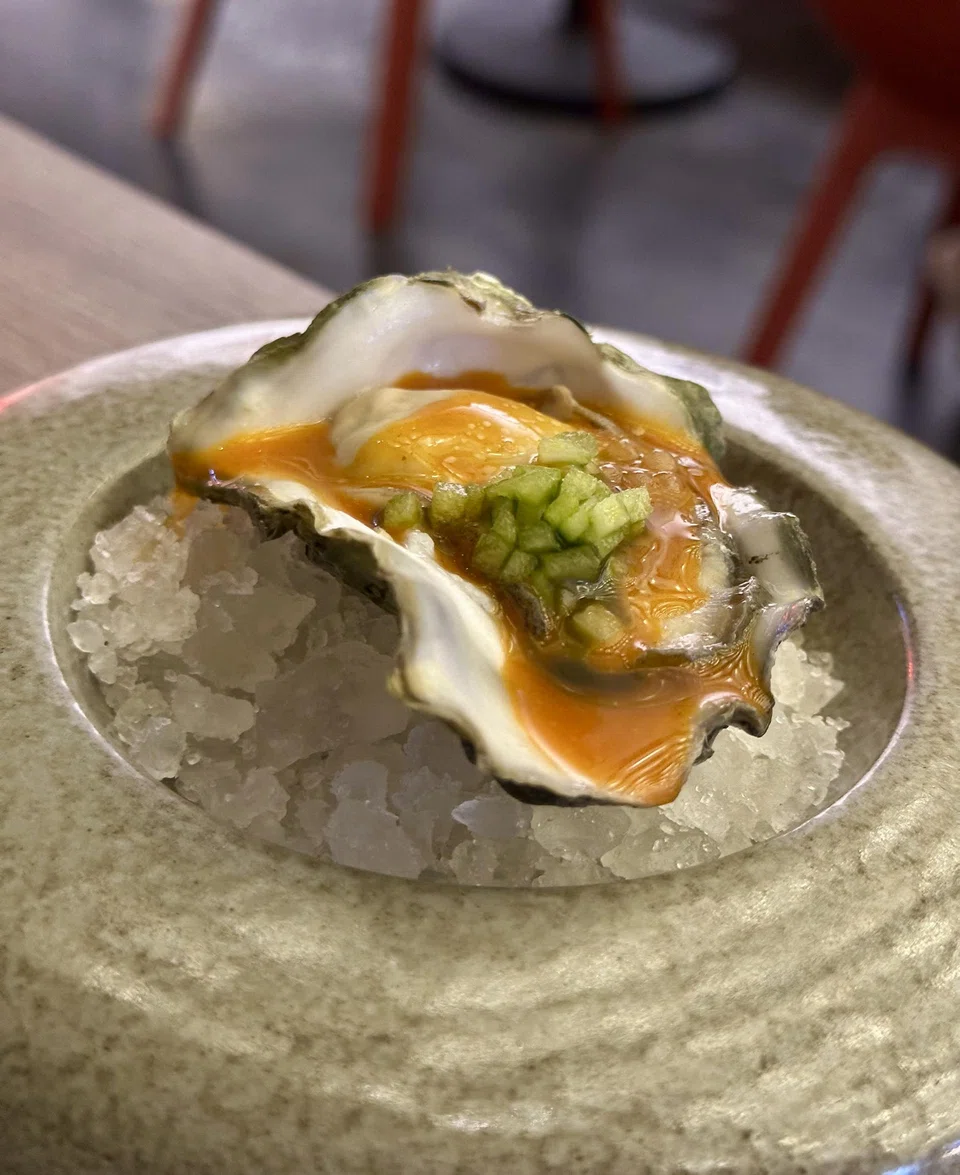 Canadian oysters splashed with chilli crab gazpacho.
