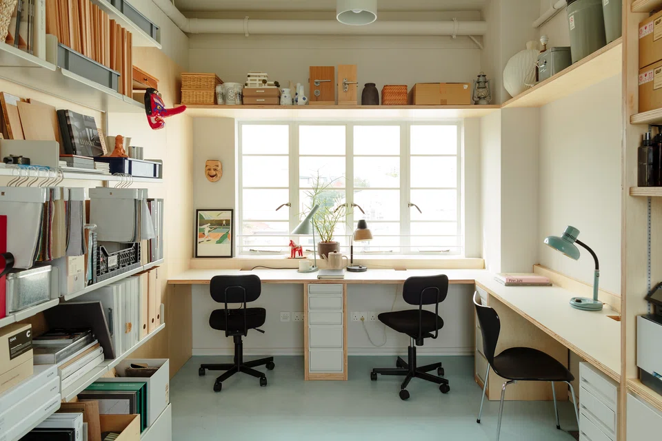 Traditional Japanese masks and other collectibles from interior designer Mikael Teh's travels decorate the tiny space.