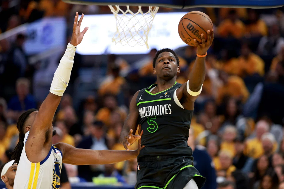 Minnesota Timberwolves against the Golden State Warriers at the NBA playoffs in May. Teams in a US major league such as the NBA are highly coveted by investors. 