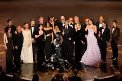 Director Paul Thomas Anderson and cast members celebrate as they accept the Oscar for Best Picture for "One Battle after Another" at the 98th Academy Awards.