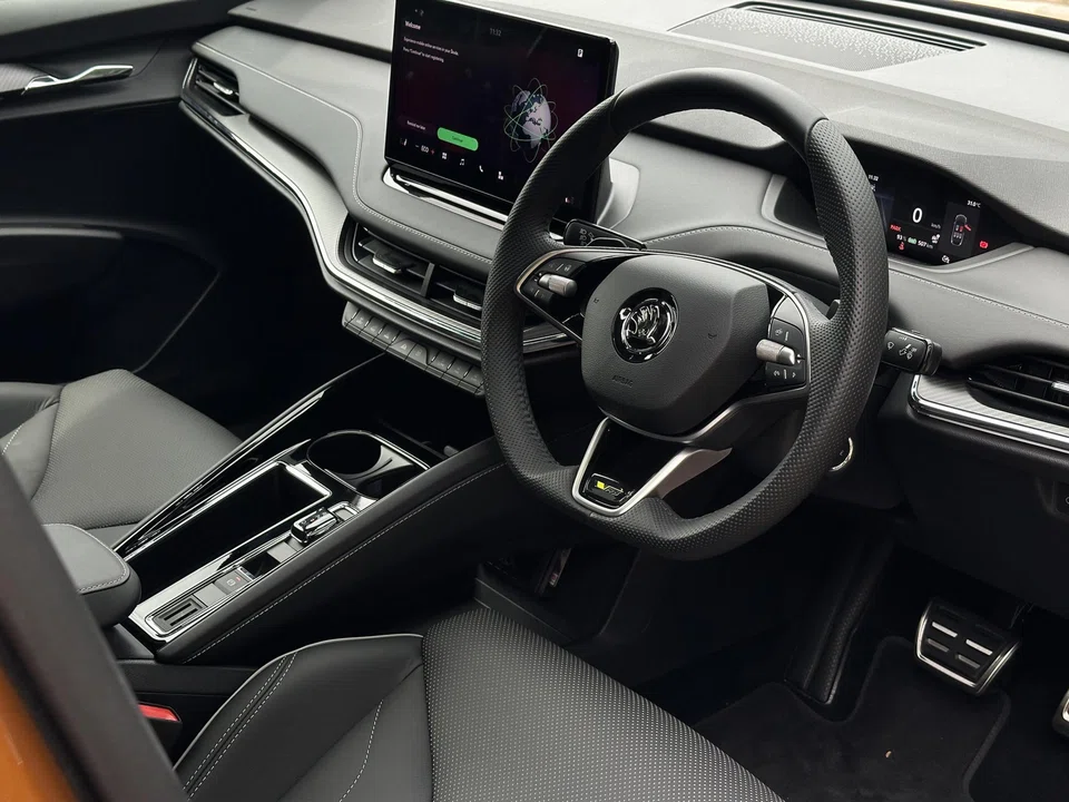 The design of the interior is brimming with clever touches: coin and card slots in the centre console, an umbrella stashed in the door and velcro cargo stays to keep your groceries from tumbling about.
