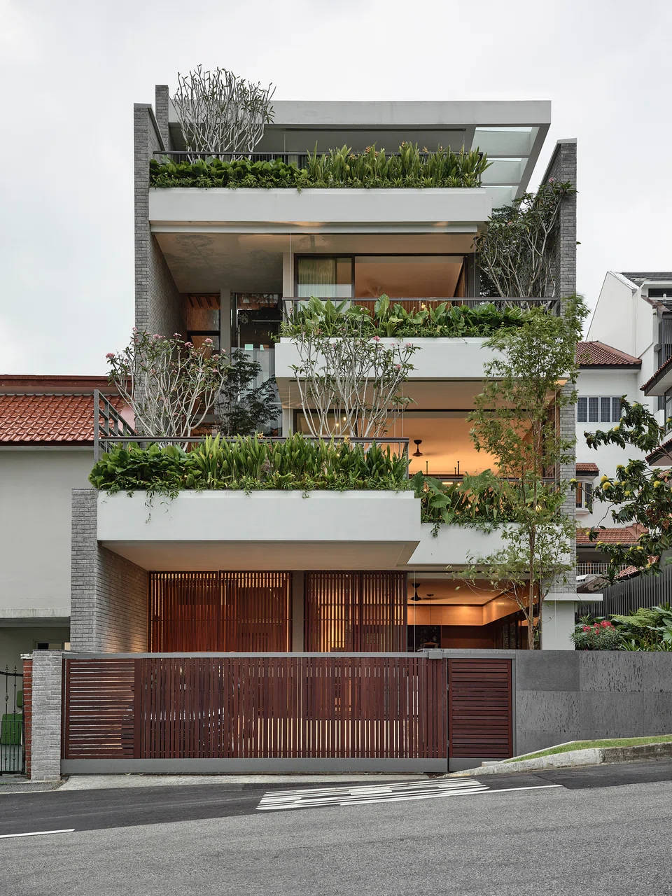 The simple architecture incorporates plenty of landscaping.