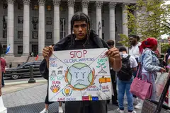 A young climate activist at a demonstration in New York City on Sep 20. Businesses that invest in the next generation through capacity-building and bringing youth to the brainstorming and decision-making table will gain hugely, says the writer. 