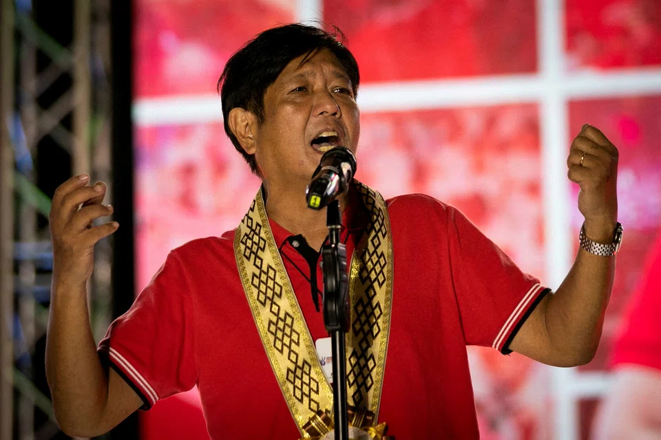 The son of the disgraced late Philippines dictator Ferdinand Marcos vowed on Tuesday to work for all people after his stunning election victory, and told the world to judge him by his presidency, not his family’s past.