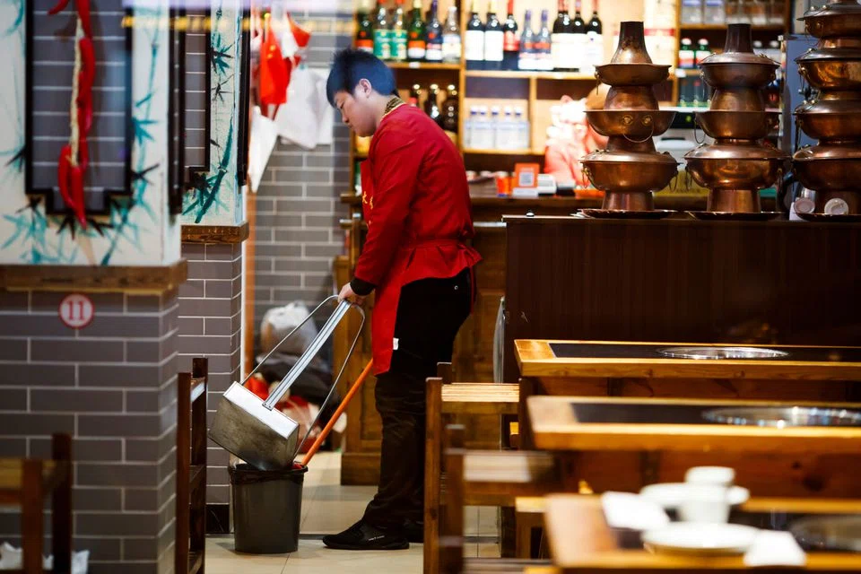 China's services activity shrank less sharply in May, an official survey showed on Tuesday, as Covid-19 restrictions in some cities were relaxed. 